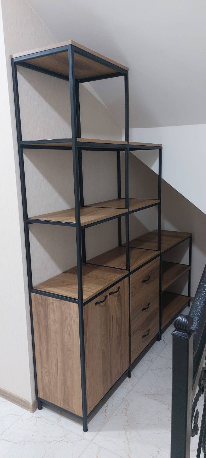 Storage fitted beneath the stairs